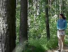 Cute lonely walker playing watersports in forest