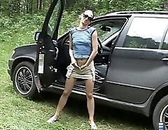 Rich slut hops out of her ride to play watersports