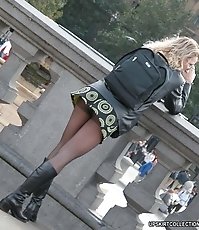 Voyeur upskirt pictures with panty peeking out in public