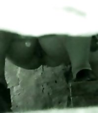 Raunchy hotties urinates onto spy cam in public loo