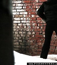 Daring girl empties her bladder on a snowy street