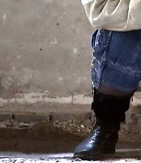 Voyeur shots of an unsuspecting girl taking a leak