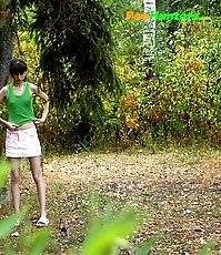 Little babe takes a leak in the nearby bushes