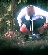 Big-titted fatty empties her bladder in voyeur pics