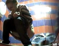 Pissing girls get busted and filmed in public loo