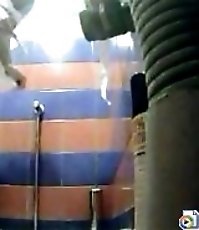 Tall beauty with long legs caught peeing by voyeur