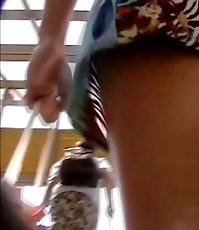 Skimpy up skirt video in a crowd