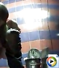 Sweet chick in glasses busted by a toilet voyeur