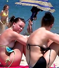 Bikinis slide down uncovering babes' hot tits