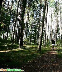 Swarthy puss searching for a quiet place to pee