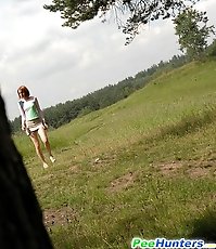 Kinky young pisser gets all naked in the woods