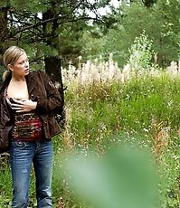 Blonde ho pissing in the middle of a country road