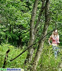 Blonde cutie empties her bladder in the forest