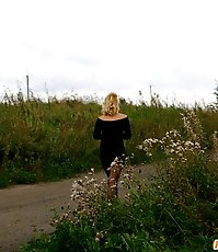 Video of a blonde tart doing the wee-wee on the road