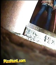 Redhair hottie gets spycammed while tinkling