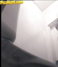 Juicy blonde gets spycammed while taking a leak