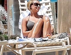 Hot bikini babes on bright summer sun